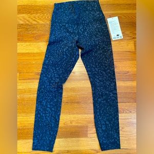 Brand new wunder under lululemon black and grey leggings, size 4